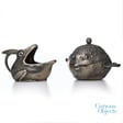 Tiffany's frog-shaped creamer and pufferfish sugar dish, at the Met image